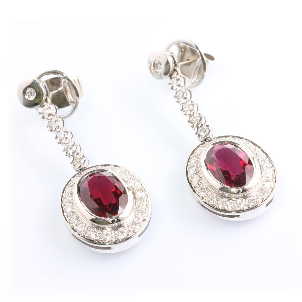 Earrings with rubellite tourmaline and diamonds in 18K white gold; handmade.  Exclusive piece.
